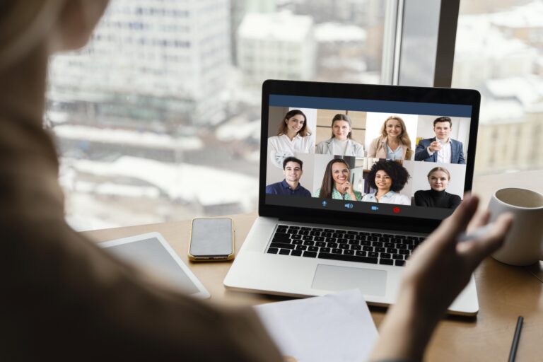 back-view-woman-having-video-call-work